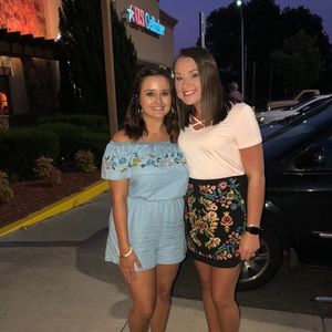 Floral romper (on left)